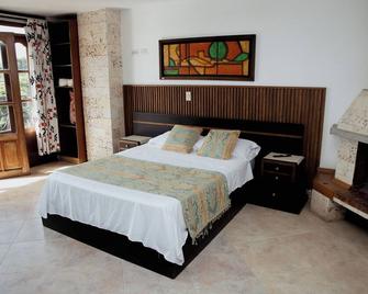 Hotel Portal Guatapé - Guatape - Спальня