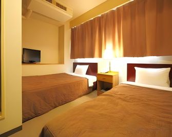 Nagoya New Rolen Hotel - Nagóia - Quarto