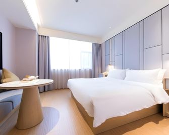JI Hotel Shanghai Xujiahui Yishan Road Branch - شنغهاي - غرفة نوم