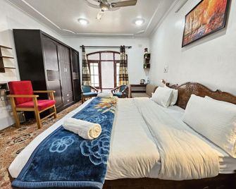 Hotel The Mallard - Srinagar - Slaapkamer
