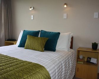 جينيز بد آند بريكفاست - نيو بليموث - غرفة نوم