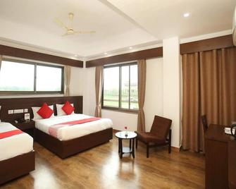 Hotel Aloka Inn - Lumbini Sanskritik - Спальня
