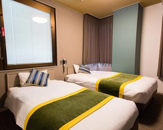 Hotel Areaone Nobeoka - Nobeoka - Camera da letto