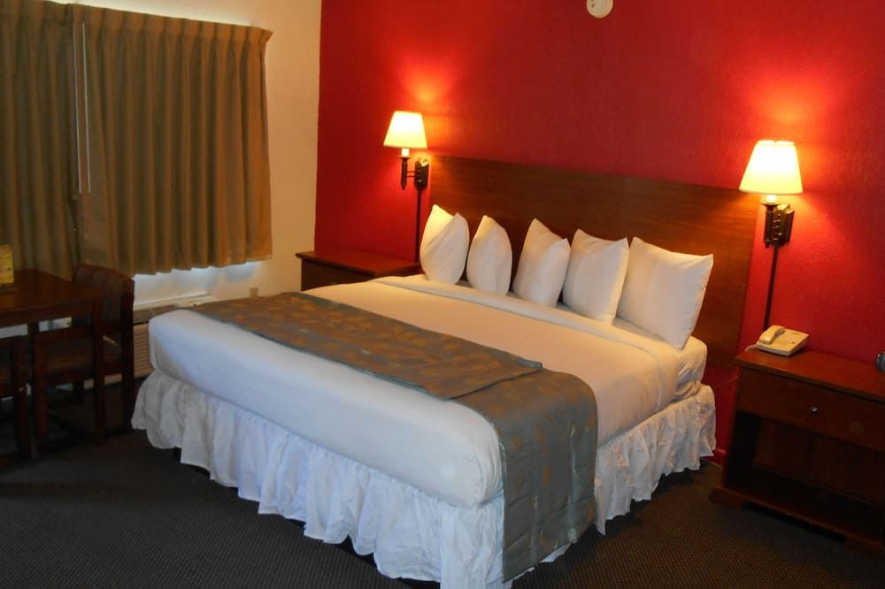 Econo Lodge Inn & Suites Abilene East District - אביליין - חדר שינה