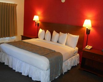 Econo Lodge Inn & Suites Abilene East District - Abilene - Schlafzimmer