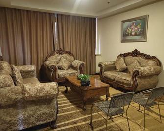 Cheyou Hotel - Hami - Sala de estar