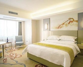 Vienna Hotel Harbin Central Avenue - חרבין - חדר שינה