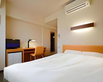 Smile Hotel Sakurambo Higashine - Higashine - Спальня