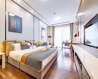 Millenia Executive Apartment Guangzhou East Railway Station Zhujiang New Town Branch - Free Shuttle Bus to Canton Fair Complex During Canton Fair Period - Guangzhou - Bedroom