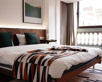 Homestay above wet market - Quanzhou - Makuuhuone