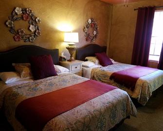 Los Milagros Hotel - Columbus - Bedroom