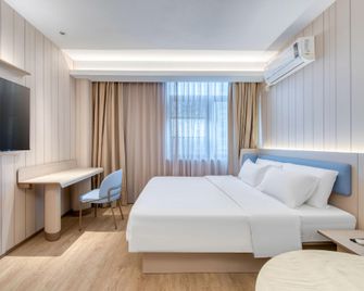 Hanting Hotel Nanjing Pukou Nanda - נאנז'ינג - חדר שינה