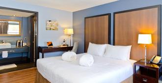 Centro Motel - Calgary - Phòng ngủ