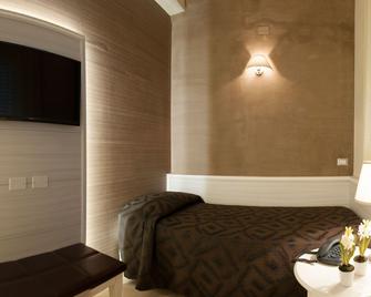 Hotel Fini - סן ג'ובאני רוטונדו - חדר שינה