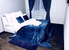 Deluxe Apartments - Volgograd - Bedroom