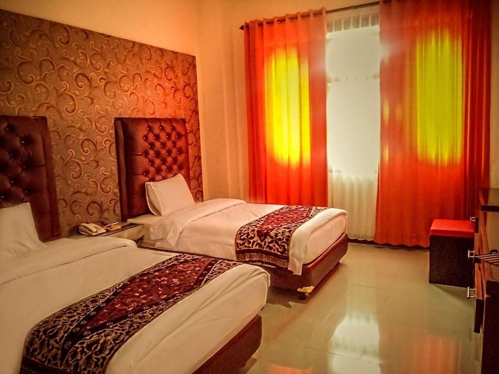 Grand City Hotel Batu - Batu - Schlafzimmer
