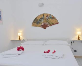 Welcomely - Doria Bassa 38 - Costa Rei - Camera da letto