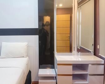 Simply 1Br at 31St Floor Vida View Makassar Apartment - Makassar - Bedroom
