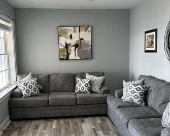 Beach By Day Sunset By Night. - Villas - Living room