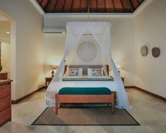 Parigata Villas Resort - Denpasar - Bedroom