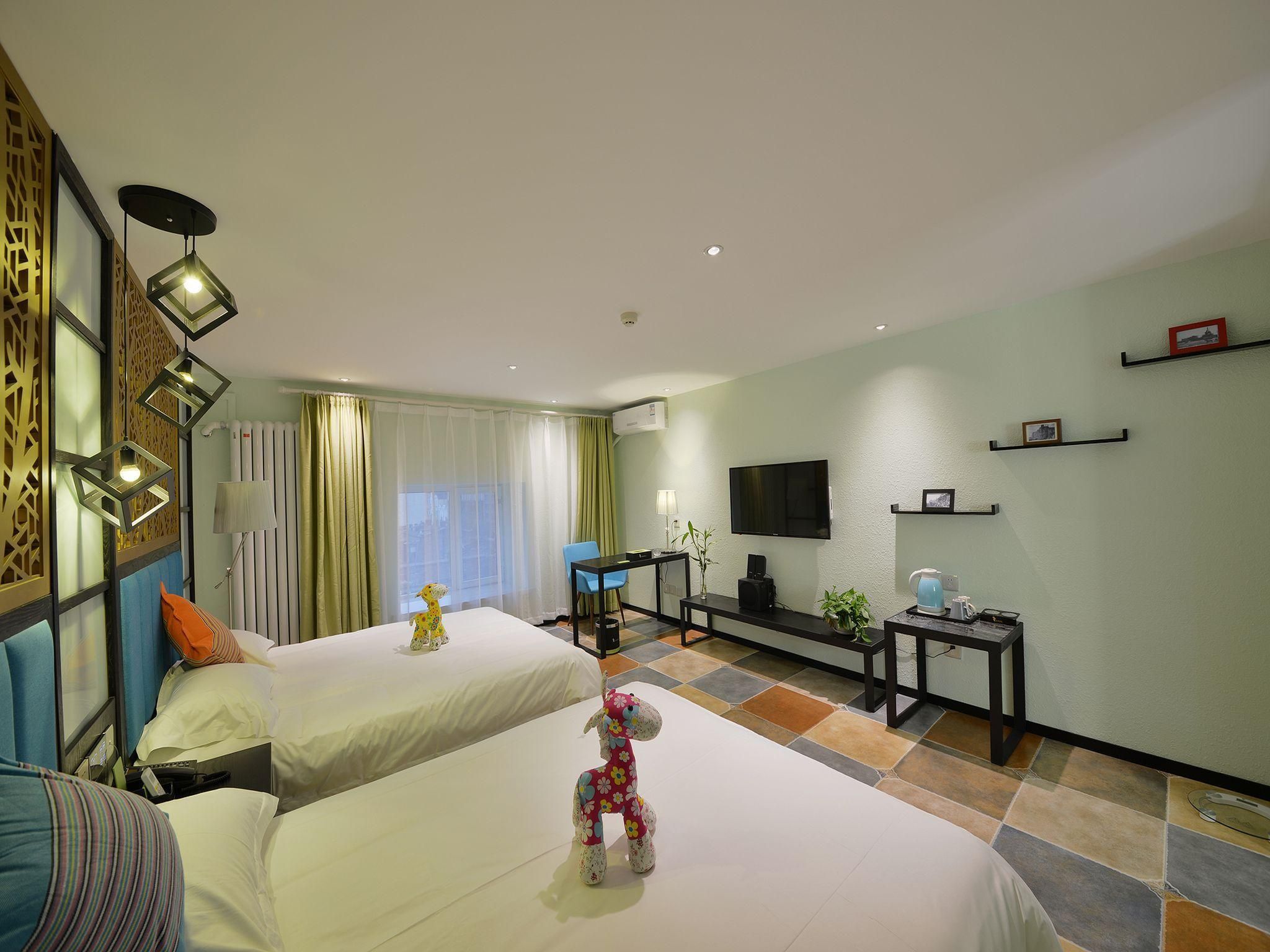 Harbin Blue Feather Hotel - חרבין - חדר שינה