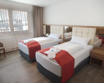 Hotel Hausen Obertshausen Frankfurt - Obertshausen - Спальня