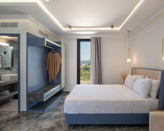 Acropol Golden Suites - Néos Marmarás - Dormitor