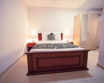 Hotel L'Adagio - Libreville - Schlafzimmer