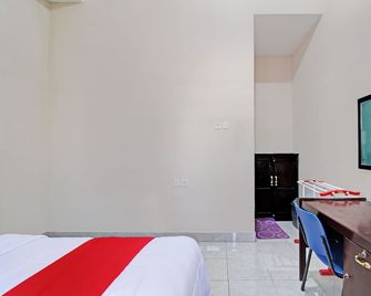 Hotel O Lavina Guesthouse - Dumai