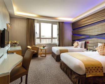 Al Safir Hotel - Manama - Schlafzimmer