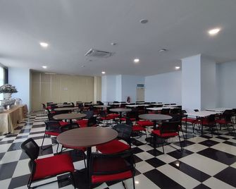 Hotel Sutha Inn Syariah - Jambi - Restaurant