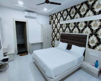 Hotel Rest and Leaf - Ānand - Schlafzimmer