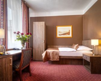 فندق Harmony - براغ - غرفة نوم