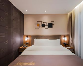 Home Inn Plus Ma'anshan Wanda Plaza Mengniu Industrial Park - Ma'anshan - Habitación