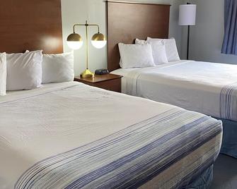 AmericInn by Wyndham Webster City - Webster City - Schlafzimmer
