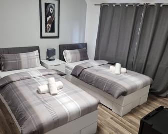 Gästezimmer Sarstedt - Sarstedt - Schlafzimmer