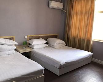 Qufu Ruihe Inn - Jining - Habitación