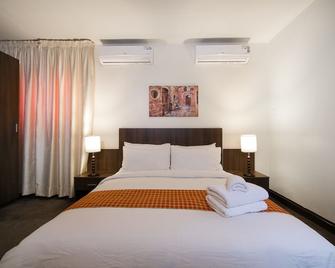Sinclair Guest House - Abuja - Bedroom
