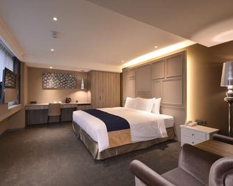 غرين وورلد هوتلز زونغسياو - مدينة تايبيه - غرفة نوم