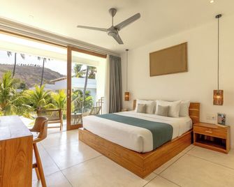 Sikara Lombok Hotel - Kuta - חדר שינה