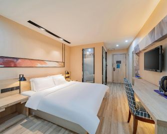 Rest Motel(Yancheng Tongma Store) - Yancheng - Bedroom