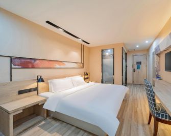 Rest Motel(Yancheng Tongma Store) - Yancheng - Bedroom