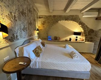 La Bartolomea Home & Suite - Pitigliano - Bedroom