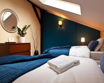 Blooms Inn & Apartments - Poznan - Bedroom