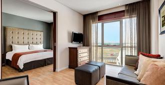 Protea Hotel by Marriott O.R. Tambo Airport - Johanesburgo - Sala de estar