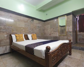 Spot On 65272 Ganapathy Lodge - Kumbakonam - Schlafzimmer