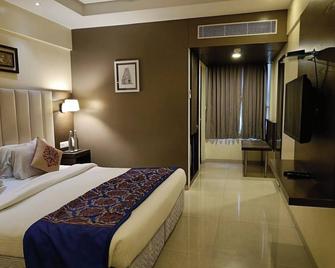 Hotel Ganpat Grand Palani - Palani - Bedroom