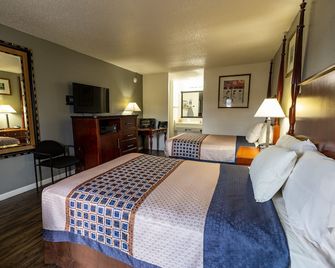 American Inn & Suites Russellville - Russellville - Ložnice