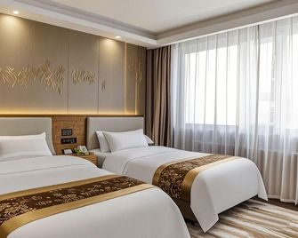 Beiguo Zhichun Business Hotel - Hulunbuir - Bedroom