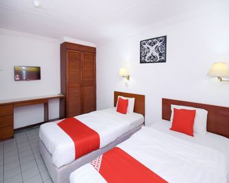 Super OYO 1018 Telang Usan Hotel Miri - Miri - Habitación